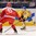 MINSK, BELARUS - MAY 10: Sweden's Mikael Backlund #60 fires a shot past Denmark's Stefan Lassen #6 during preliminary round action at the 2014 IIHF Ice Hockey World Championship. (Photo by Richard Wolowicz/HHOF-IIHF Images)


